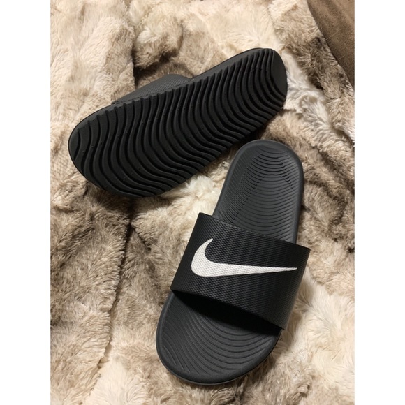nike kawa slide on feet